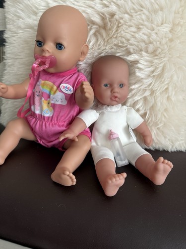 Two dolls - two,
